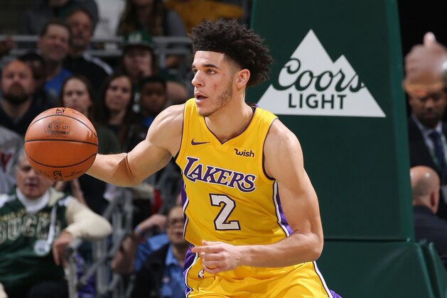 MILWAUKEE, WI - NOVEMBER 11: Lonzo Ball #2 of the Los Angeles Lakers handles the ball against the Milwaukee Bucks on November 11, 2017 at the BMO Harris Bradley Center in Milwaukee, Wisconsin. NOTE TO USER: User expressly acknowledges and agrees that, by downloading and or using this Photograph, user is consenting to the terms and conditions of the Getty Images License Agreement. Mandatory Copyright Notice: Copyright 2017 NBAE (Photo by Gary Dineen/NBAE via Getty Images)