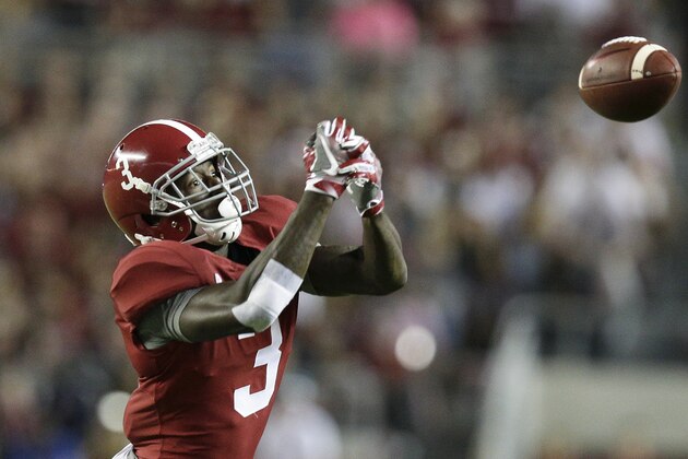 Alabama wide receiver Calvin Ridley misses the ball during the first half of an NCAA college football game against Mississippi, Saturday, Sept. 30, 2017, in Tuscaloosa, Ala. Alabama won 66-3. (AP Photo/Brynn Anderson)