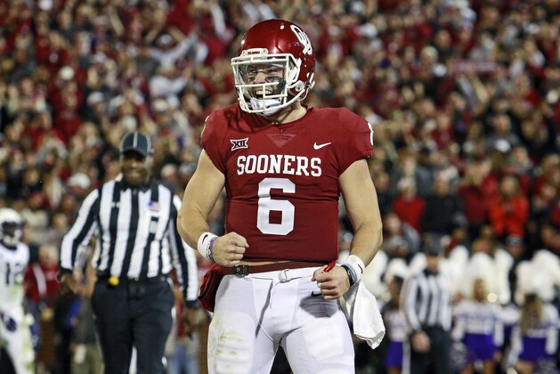 NORMAN, OK - NOVEMBER 11: Quarterback Baker Mayfield #6 of the Oklahoma Sooners celebrates a touchdown against the TCU Horned Frogs at Gaylord Family Oklahoma Memorial Stadium on November 11, 2017 in Norman, Oklahoma. (Photo by Brett Deering/Getty Images)