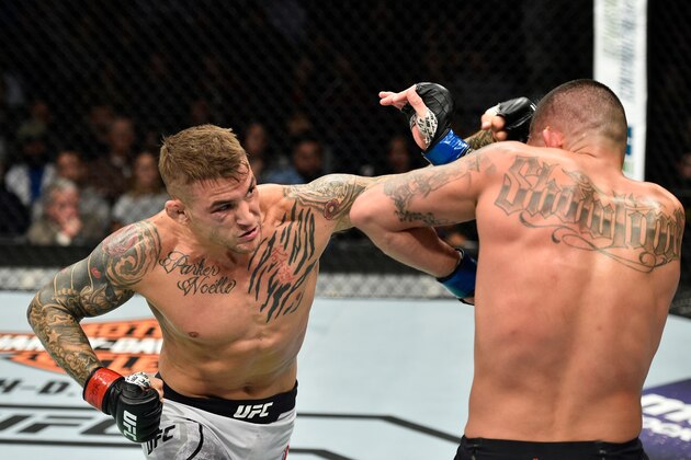NORFOLK, VA - NOVEMBER 11:  (L-R) Dustin Poirier punches Anthony Pettis in their lightweight bout during the UFC Fight Night event inside the Ted Constant Convention Center on November 11, 2017 in Norfolk, Virginia. (Photo by Brandon Magnus/Zuffa LLC/Zuffa LLC via Getty Images)