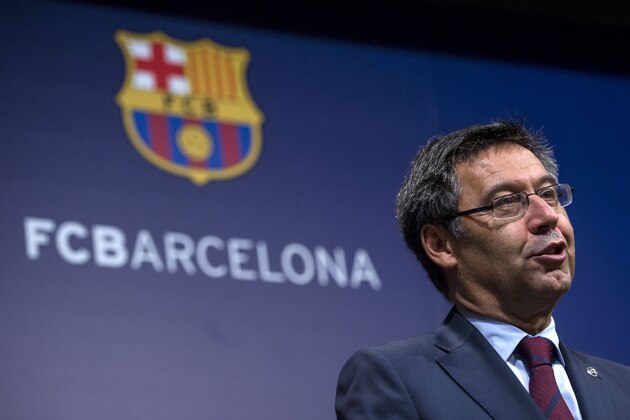 FC Barcelona's president Josep Maria Bartomeu speaks during a press conference at the Camp Nou stadium in Barcelona on October 2, 2017.
Barcelona president Josep Maria Bartomeu confirmed today two of the club's board members resigned in the wake of his decision to play a match behind closed doors after a violent crackdown by police of an independence referendum for Catalonia yesterday. / AFP PHOTO / Josep LAGO        (Photo credit should read JOSEP LAGO/AFP/Getty Images)