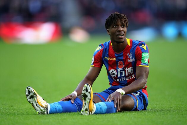 LONDON, ENGLAND - NOVEMBER 05: Wilfried Zaha of Crystal Palace reacts during the Premier League match between Tottenham Hotspur and Crystal Palace at Wembley Stadium on November 5, 2017 in London, England.  (Photo by Julian Finney/Getty Images)