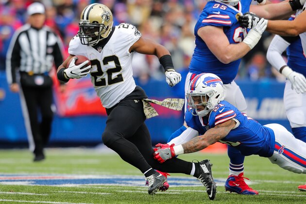 ORCHARD PARK, NY - NOVEMBER 12:  Mark Ingram #22 of the New Orleans Saints runs the ball as Jordan Poyer #21 of the Buffalo Bills attempts to tackle him during the first quarter on November 12, 2017 at New Era Field in Orchard Park, New York.  (Photo by Brett Carlsen/Getty Images)