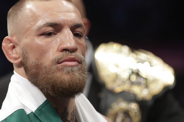 Conor McGregor enters the ring before a super welterweight boxing match against Floyd Mayweather Jr., Saturday, Aug. 26, 2017, in Las Vegas. (AP Photo/Isaac Brekken)