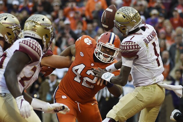 Clemson defensive lineman Christian Wilkins (42) blocks a pass from Florida State quarterback James Blackman (1) during the first half of an NCAA college football game, Saturday, Nov. 11, 2017, in Clemson, S.C. (AP Photo/Rainier Ehrhardt)