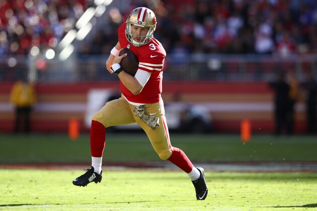 SANTA CLARA, CA - NOVEMBER 12:  C.J. Beathard #3 of the San Francisco 49ers scrambles with the ball against the New York Giants during their NFL game at Levi's Stadium on November 12, 2017 in Santa Clara, California.  (Photo by Ezra Shaw/Getty Images)