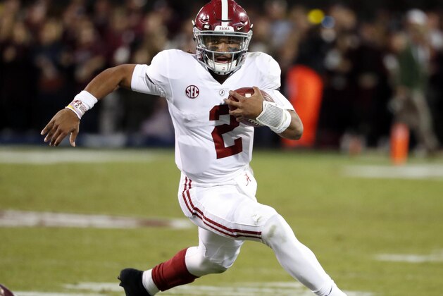 Alabama quarterback Jalen Hurts carries for a short gain against Mississippi State during the second half of an NCAA college football game in Starkville, Miss., Saturday, Nov. 11, 2017. Alabama won 31-24. (AP Photo/Rogelio V. Solis)