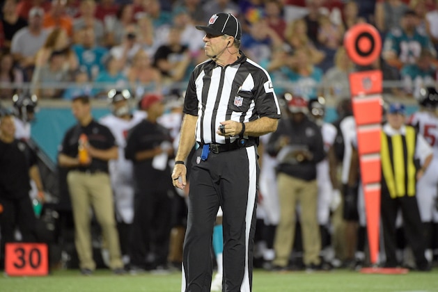 Umpire Jeff Rice  gets ready for a play during the first half of an NFL preseason football game between the Miami Dolphins and the Atlanta Falcons in Orlando, Fla., Thursday, Aug. 25, 2016.(AP Photo/Phelan M. Ebenhack)