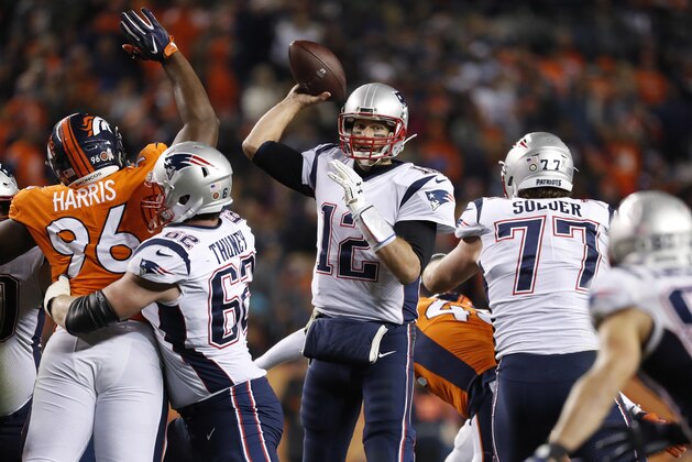 New England Patriots quarterback Tom Brady (12) throws against the Denver Broncos during the second half of an NFL football game, Sunday, Nov. 12, 2017, in Denver. (AP Photo/Jack Dempsey)