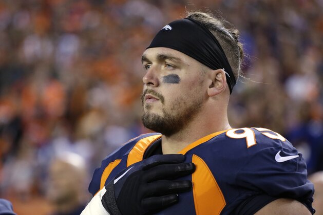 Denver Broncos defensive end Derek Wolfe stands during the the National Anthem before an NFL football game against the New York Giants Sunday, Oct. 15, 2017, in Denver. (AP Photo/Jack Dempsey)