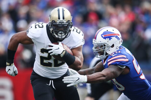 ORCHARD PARK, NY - NOVEMBER 12:  Mark Ingram #22 of the New Orleans Saints runs the ball as Ramon Humber #50 of the Buffalo Bills attempts to tackle him during the first quarter on November 12, 2017 at New Era Field in Orchard Park, New York.  (Photo by Tom Szczerbowski/Getty Images)