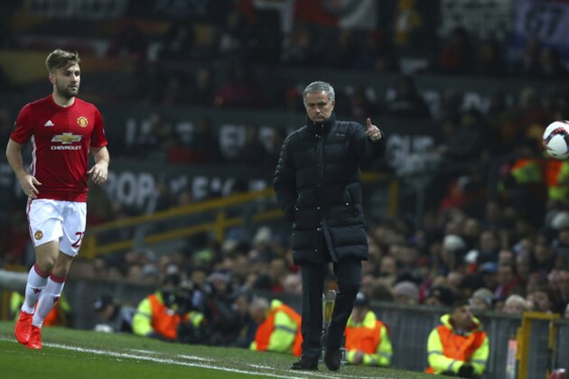 Manchester United's manager José Mourinho, gestures as his player Manchester United's Luke Shaw goes to collect the ball during the Europa League group A soccer match between Manchester United and Feyenoord at the Old Trafford in Manchester, England, Thursday, Nov. 24, 2016. (AP Photo/Dave Thompson)
