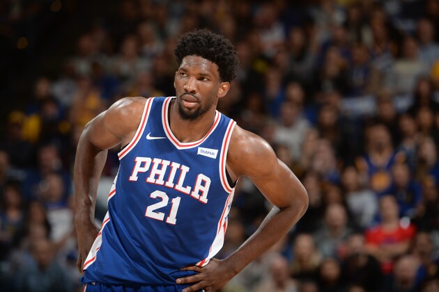 OAKLAND, CA - NOVEMBER 11:  Joel Embiid #21 of the Philadelphia 76ers looks on during the game against the Golden State Warriors on November 11, 2017 at ORACLE Arena in Oakland, California. NOTE TO USER: User expressly acknowledges and agrees that, by downloading and or using this photograph, user is consenting to the terms and conditions of Getty Images License Agreement. Mandatory Copyright Notice: Copyright 2017 NBAE (Photo by Noah Graham/NBAE via Getty Images)