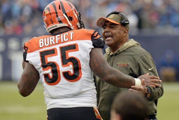 Cincinnati Bengals head coach Marvin Lewis talks with outside linebacker Vontaze Burfict (55) after Burfict was ejected for making contact with an official in the first half of an NFL football game against the Tennessee Titans Sunday, Nov. 12, 2017, in Nashville, Tenn. (AP Photo/Mark Zaleski)