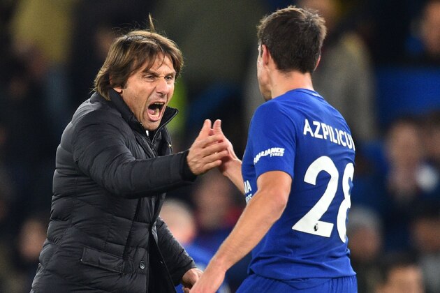 Chelsea's Italian head coach Antonio Conte celebrates on the pitch with Chelsea's Spanish defender Cesar Azpilicueta (R) after the English Premier League football match between Chelsea and Manchester United at Stamford Bridge in London on November 5, 2017.
Chelsea won the game 1-0. / AFP PHOTO / Glyn KIRK / RESTRICTED TO EDITORIAL USE. No use with unauthorized audio, video, data, fixture lists, club/league logos or 'live' services. Online in-match use limited to 75 images, no video emulation. No use in betting, games or single club/league/player publications. / (Photo credit should read GLYN KIRK/AFP/Getty Images) Chelsea's Italian head coach Antonio Conte celebrates on the pitch with Chelsea's Spanish defender Cesar Azpilicueta (R) after the English Premier League football match between Chelsea and Manchester United at Stamford Bridge in London on November 5, 2017.
Chelsea won the game 1-0. / AFP PHOTO / Glyn KIRK / RESTRICTED TO EDITORIAL USE. No use with unauthorized audio, video, data, fixture lists, club/league logos or 'live' services. Online in-match use limited to 75 images, no video emulation. No use in betting, games or single club/league/player publications. / (Photo credit should read GLYN KIRK/AFP/Getty Images)