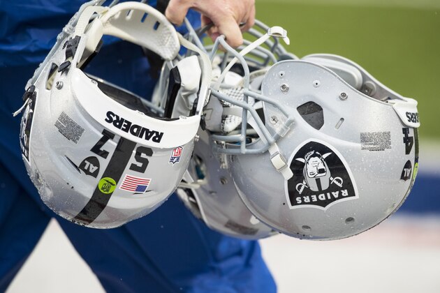 ORCHARD PARK, NY - OCTOBER 29:  Oakland Raiders helmets are carried by equipment staff before the game against the Buffalo Bills at New Era Field on October 29, 2017 in Orchard Park, New York. Buffalo defeats Oakland 34-14. (Photo by Brett Carlsen/Getty Images) *** Local Caption ***