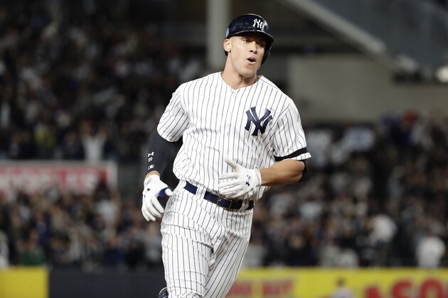 New York Yankees' Aaron Judge runs the bases after hitting a two-run home run during the fourth inning of the American League wild-card baseball game against the Minnesota Twins Tuesday, Oct. 3, 2017, in New York. (AP Photo/Frank Franklin II)