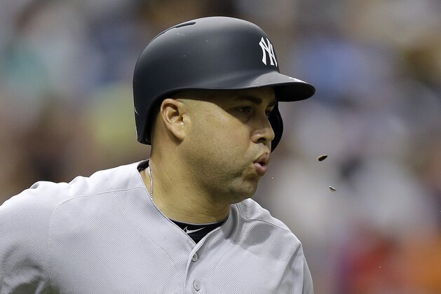 New York Yankees' Carlos Beltran spits sunflower seeds as he runs the bases after his home run off Tampa Bay Rays starting pitcher Matt Moore during the fourth inning of a baseball game, Saturday, May 28, 2016, in St. Petersburg, Fla. (AP Photo/Chris O'Meara)