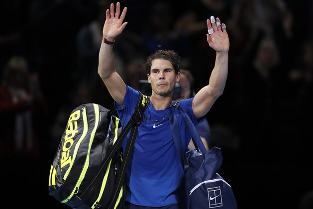 Rafael Nadal of Spain waves to supporters after losing his singles tennis match against David Goffin of Belgium at the ATP World Finals at the O2 Arena in London, Monday, Nov. 13, 2017. (AP Photo/Kirsty Wigglesworth)