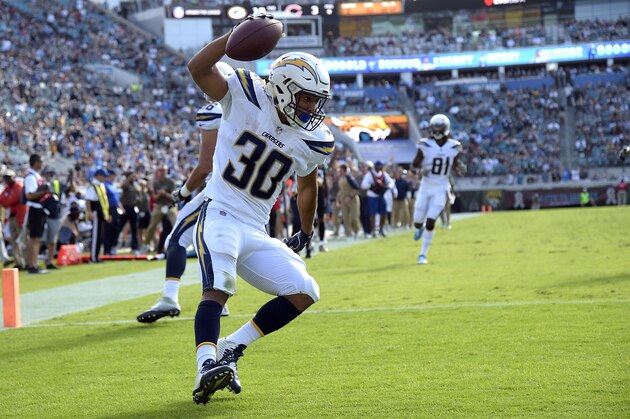 Los Angeles Chargers running back Austin Ekeler (30) runs in the end zone for a touchdown against the Jacksonville Jaguars during the first half of an NFL football game, Sunday, Nov. 12, 2017, in Jacksonville, Fla. (AP Photo/Phelan M. Ebenhack)