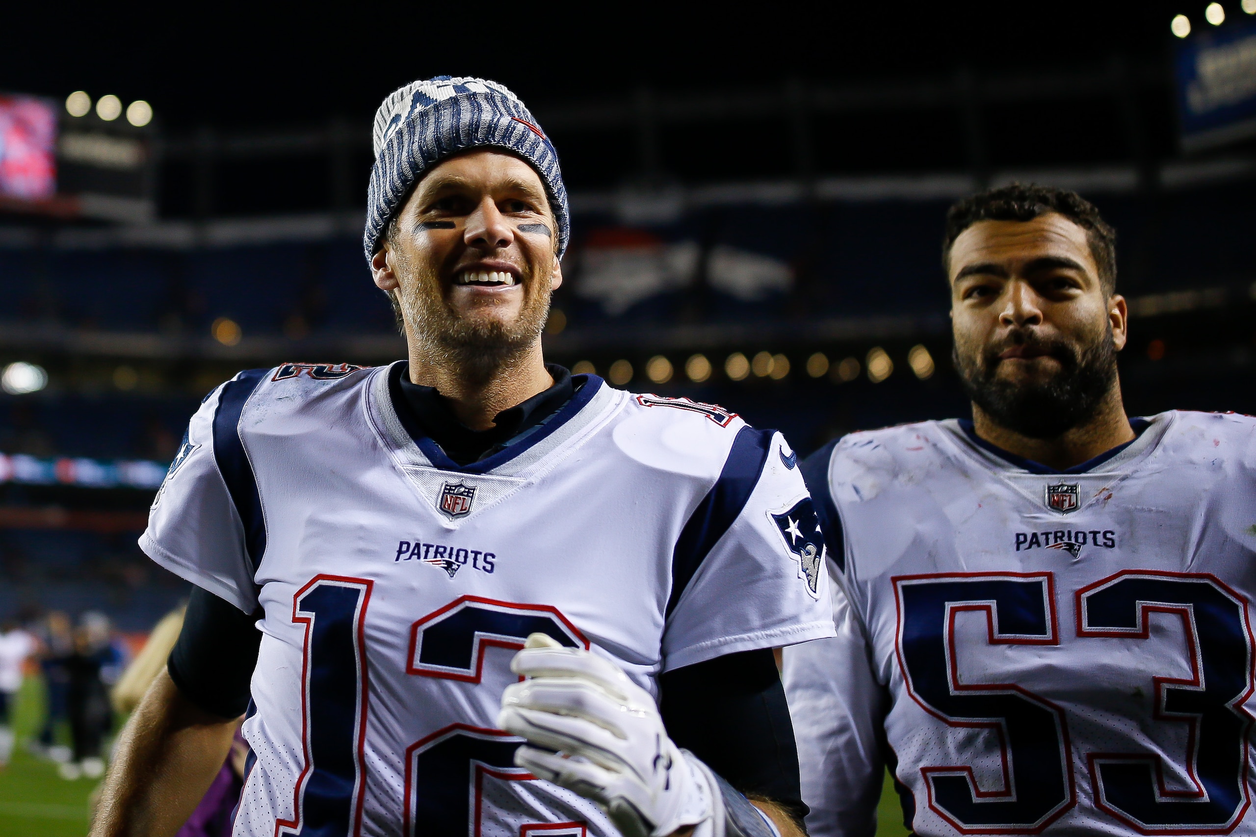 DENVER, CO - NOVEMBER 12:  Quarterback Tom Brady #12 of the New England Patriots walks off the field after a 41-16 win over the Denver Broncos at Sports Authority Field at Mile High on November 12, 2017 in Denver, Colorado. (Photo by Justin Edmonds/Getty Images)