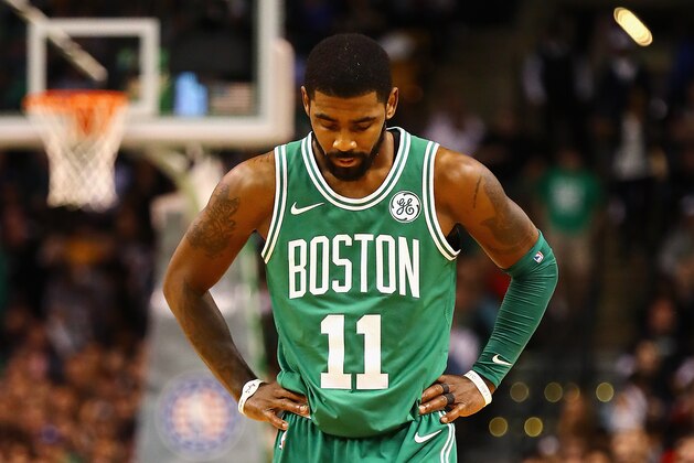 BOSTON, MA - NOVEMBER 08:  Kyrie Irving #11 of the Boston Celtics reacts during the first quarter against the Los Angeles Lakers at TD Garden on November 8, 2017 in Boston, Massachusetts.  (Photo by Tim Bradbury/Getty Images)