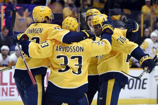 Nashville Predators defenseman P.K. Subban (76) celebrates with teammates after scoring a goal against the Pittsburgh Penguins during the second period of an NHL hockey game Saturday, Nov. 11, 2017, in Nashville, Tenn. (AP Photo/Mark Zaleski)