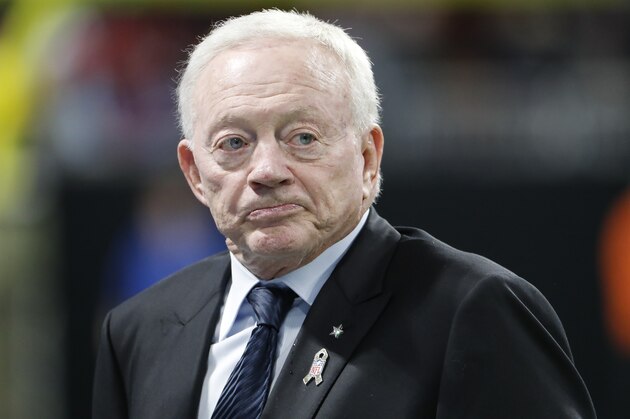 Atlanta Falcons owner Jerry Jones walks the turf inside Mercedes-Benz stadium before the first half of an NFL football game between the Atlanta Falcons and the Dallas Cowboys, Sunday, Nov. 12, 2017, in Atlanta. (AP Photo/David Goldman)