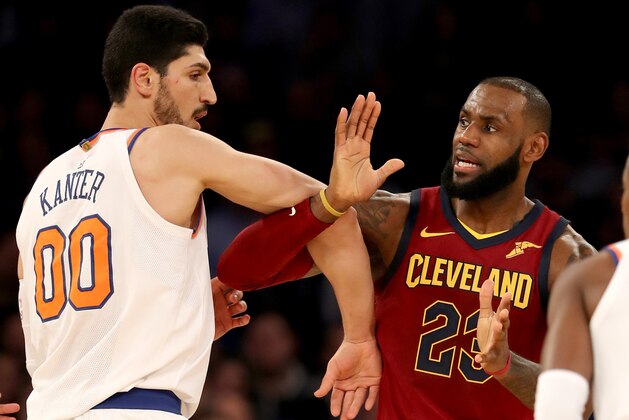 NEW YORK, NY - NOVEMBER 13:  Enes Kanter #00 of the New York Knicks and LeBron James #23 of the Cleveland Cavaliers fight for position at Madison Square Garden on November 13, 2017 in New York City. NOTE TO USER: User expressly acknowledges and agrees that, by downloading and or using this Photograph, user is consenting to the terms and conditions of the Getty Images License Agreement  (Photo by Elsa/Getty Images)