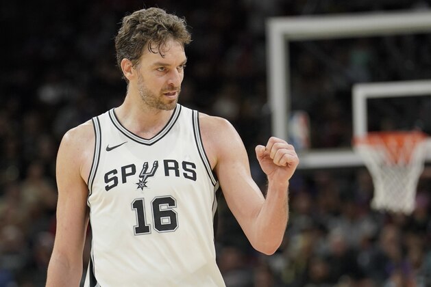 San Antonio Spurs center Pau Gasol, of Spain, celebrates a successful play during the second half of an NBA basketball game against the Chicago Bulls, Saturday, Nov. 11, 2017, in San Antonio. San Antonio won 133-94. (AP Photo/Darren Abate)