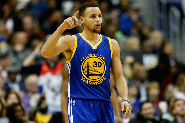 WASHINGTON, DC - FEBRUARY 03:  Stephen Curry #30 of the Golden State Warriors celebrates after scoring in the foiurth quarter against the Washington Wizards at Verizon Center on February 3, 2016 in Washington, DC. The Warriors defeated the Wizards 134 to 121. NOTE TO USER: User expressly acknowledges and agrees that, by downloading and or using this photograph, User is consenting to the terms and conditions of the Getty Images License Agreement.  (Photo by Rob Carr/Getty Images)