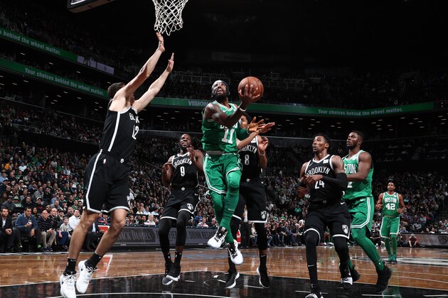 BROOKLYN, NY - NOVEMBER 14: Kyrie Irving #11 of the Boston Celtics goes to the basket against the Brooklyn Nets on November 14, 2017 at Barclays Center in Brooklyn, New York. NOTE TO USER: User expressly acknowledges and agrees that, by downloading and or using this Photograph, user is consenting to the terms and conditions of the Getty Images License Agreement. Mandatory Copyright Notice: Copyright 2017 NBAE (Photo by Nathaniel S. Butler/NBAE via Getty Images)