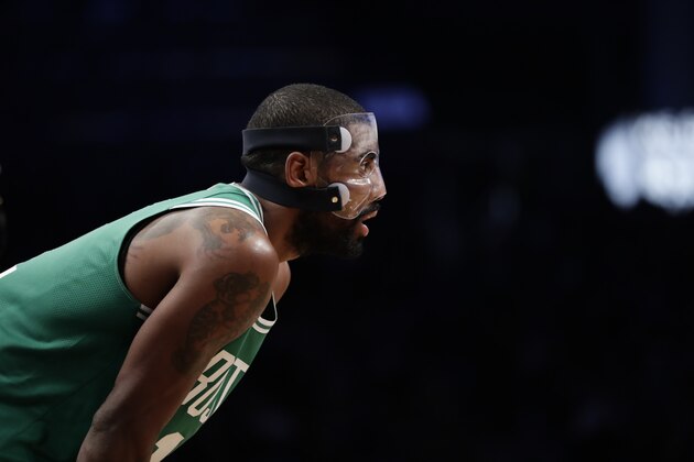 Boston Celtics' Kyrie Irving stands on the court during the second half of the team's NBA basketball game against the Brooklyn Nets on Tuesday, Nov. 14, 2017, in New York. The Celtics won 109-102. (AP Photo/Frank Franklin II)