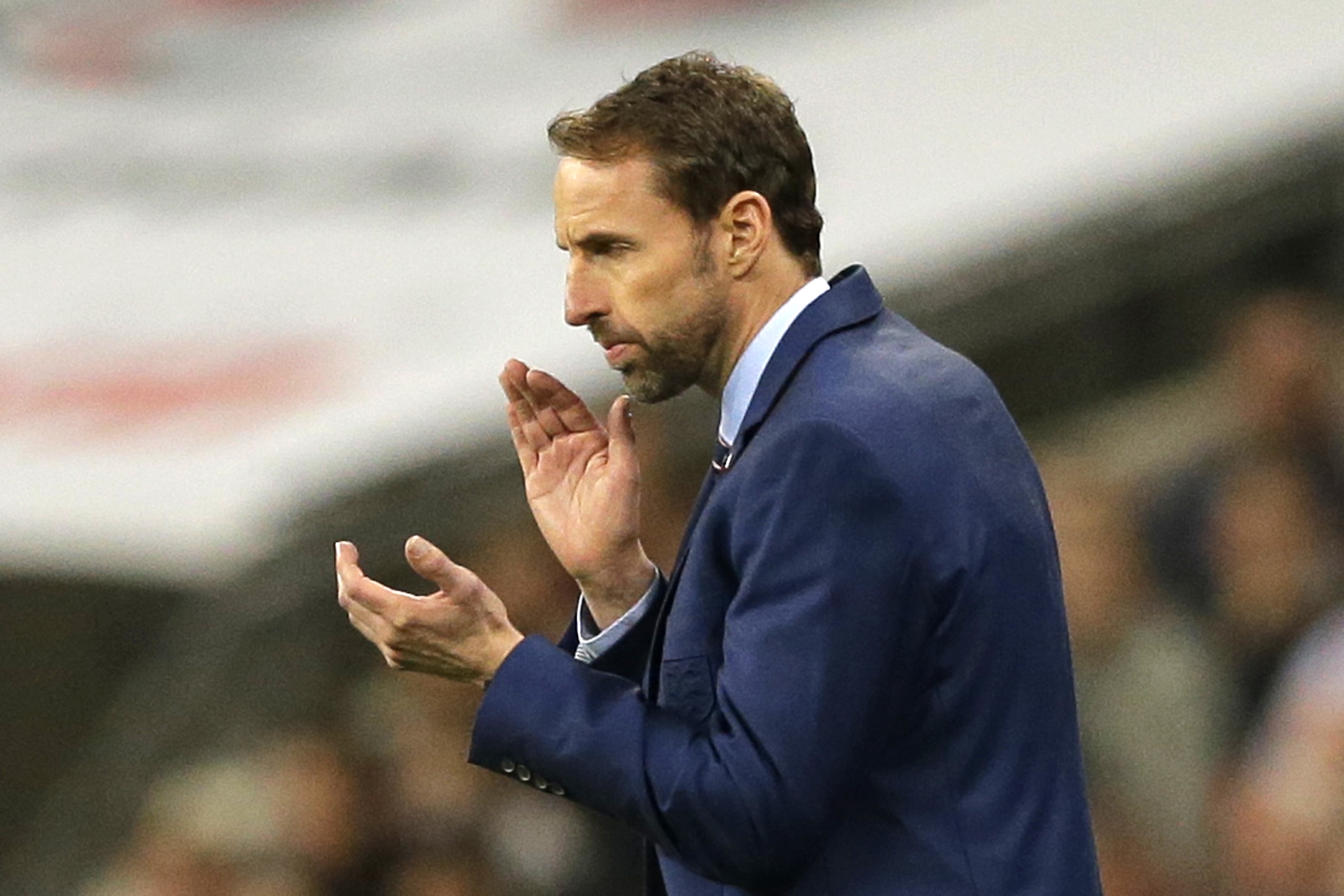 England's manager Gareth Southgate applauds his players during the international friendly soccer match between England and Brazil at Wembley stadium in London, Britain, Tuesday, Nov. 14, 2017. (AP Photo/Alastair Grant)