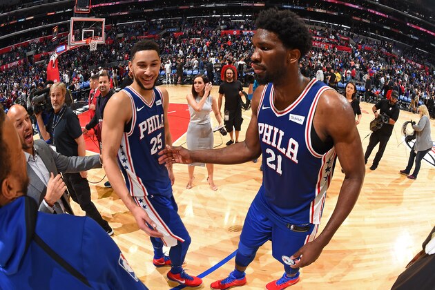 LOS ANGELES, CA - NOVEMBER 13:  Ben Simmons #25 and Joel Embiid #21 of the Philadelphia 76ers smile and shake hands after the game against the LA Clippers on November 13, 2017 at STAPLES Center in Los Angeles, California. NOTE TO USER: User expressly acknowledges and agrees that, by downloading and/or using this Photograph, user is consenting to the terms and conditions of the Getty Images License Agreement. Mandatory Copyright Notice: Copyright 2017 NBAE (Photo by Andrew D. Bernstein/NBAE via Getty Images)