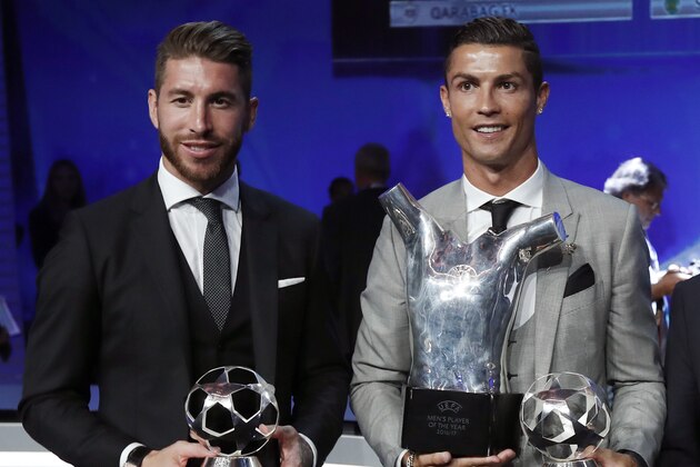 MONTE CARLO, MONACO - AUGUST 24: Sergio Ramos of Real Madrid , Cristiano Ronaldo of Real Madrid , Florentino Pérez of Real Madrid and Luka Modric of Real Madrid with the Trophys during the UEFA Champions League Group stage draw ceremony, at the Grimaldi Forum, Monte Carlo in Monaco, on August 24, 2017. (Photo by TF-Images/TF-Images via Getty Images)
