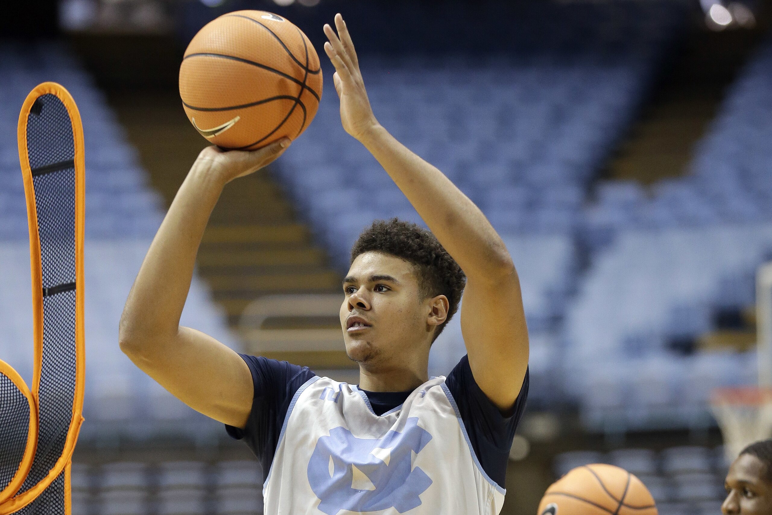 North Carolina's Cameron Johnson shoots during practice following the school's NCAA college basketball media day in Chapel Hill, N.C., Tuesday, Oct. 17, 2017. (AP Photo/Gerry Broome)