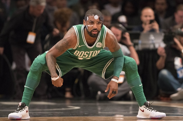 NEW YORK, NY - NOVEMBER 14:  Kyrie Irving #11 of the Boston Celtics warms up before the NBA game against the Brooklyn Nets at Barclays Center on November 14, 2017 in the Brooklyn Borough of New York City. NOTE TO USER: User expressly acknowledges and agrees that, by downloading and or using this photograph, User is consenting to the terms and conditions of the Getty Images License Agreement.  (Photo by Matteo Marchi/Getty Images)
