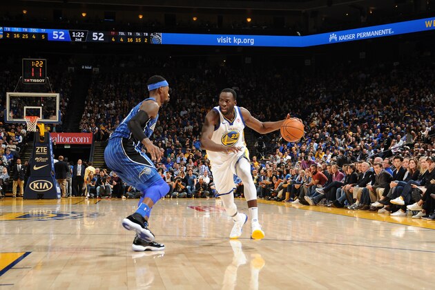 OAKLAND, CA - NOVEMBER 13:  Draymond Green #23 of the Golden State Warriors handles the ball against the Orlando Magic on November 13, 2017 at ORACLE Arena in Oakland, California. NOTE TO USER: User expressly acknowledges and agrees that, by downloading and or using this photograph, user is consenting to the terms and conditions of Getty Images License Agreement. Mandatory Copyright Notice: Copyright 2017 NBAE (Photo by Noah Graham/NBAE via Getty Images)