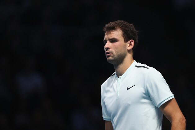 LONDON, ENGLAND - NOVEMBER 15:  Grigor Dimitrov of Bulgaria looks on during the singles match against David Goffin of Belgium on day four of the 2017 Nitto ATP World Tour Finals at O2 Arena on November 15, 2017 in London, England.  (Photo by Naomi Baker/Getty Images)