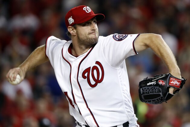 Washington Nationals relief pitcher Max Scherzer (31) throws during the fifth inning in Game 5 of baseball's National League Division Series against the Chicago Cubs, at Nationals Park, Thursday, Oct. 12, 2017, in Washington. (AP Photo/Pablo Martinez Monsivais)