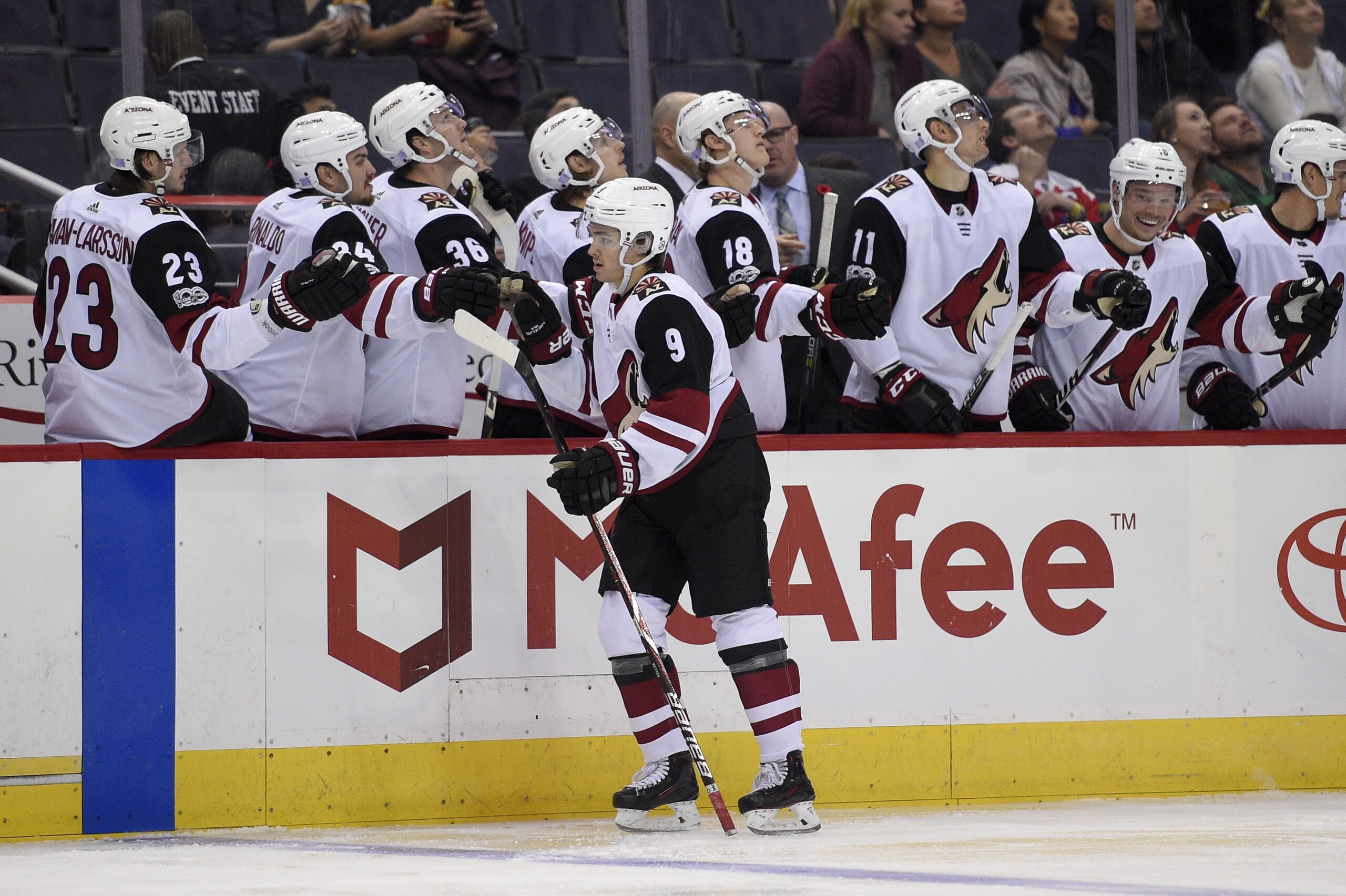 Arizona Coyotes center Clayton Keller (9) celebrates his goal with the bench during the first period of an NHL hockey game against the Washington Capitals, Monday, Nov. 6, 2017, in Washington. (AP Photo/Nick Wass)