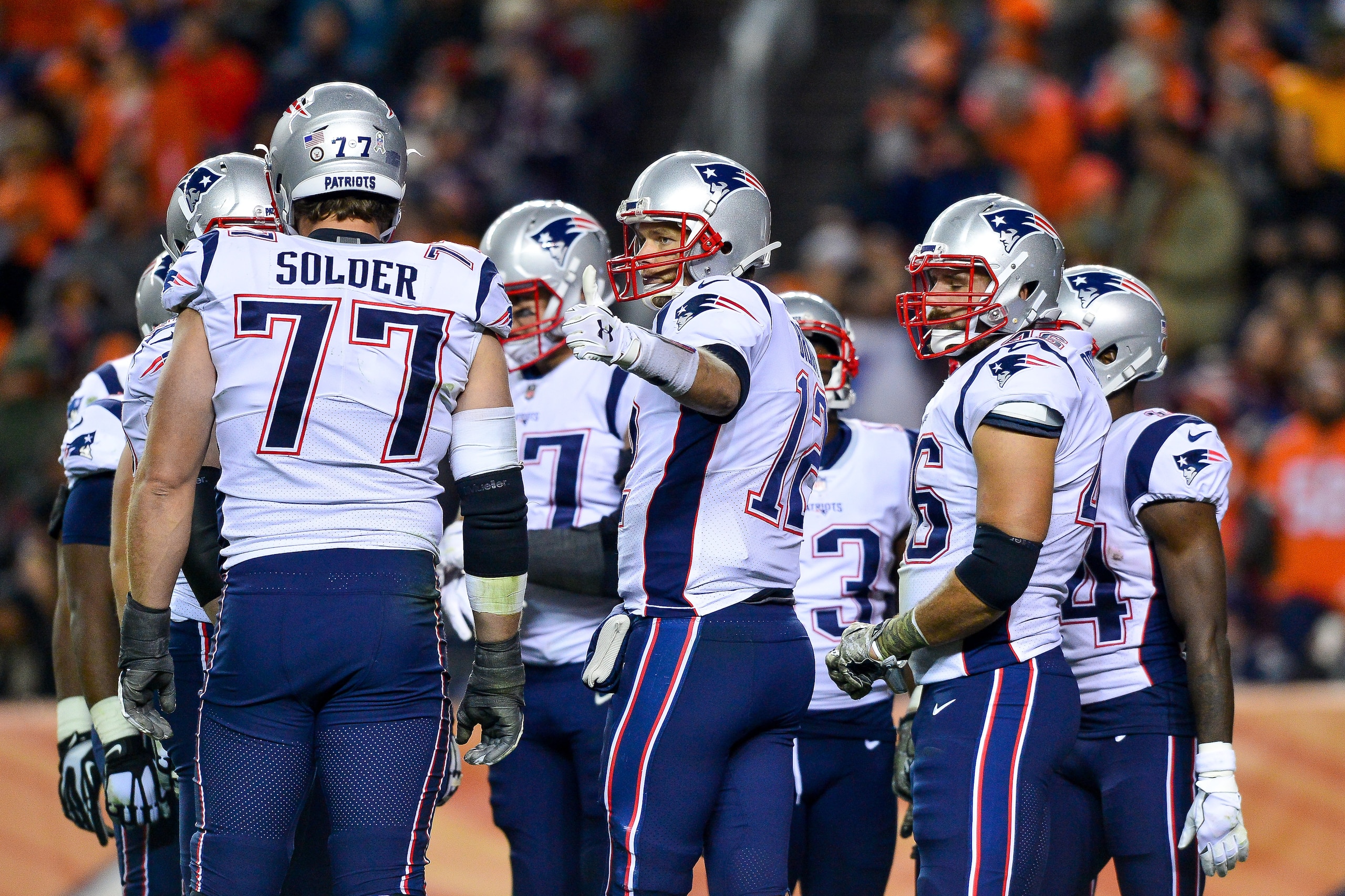DENVER, CO - NOVEMBER 12:  Quarterback Tom Brady #12 of the New England Patriots indicates that he is ready to resume play during a game against the Denver Broncos at Sports Authority Field at Mile High on November 12, 2017 in Denver, Colorado. (Photo by Dustin Bradford/Getty Images)