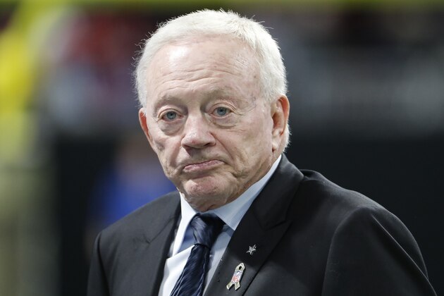 Atlanta Falcons owner Jerry Jones walks the turf inside Mercedes-Benz stadium before the first half of an NFL football game between the Atlanta Falcons and the Dallas Cowboys, Sunday, Nov. 12, 2017, in Atlanta. (AP Photo/David Goldman)