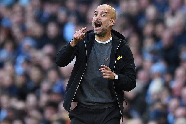 Manchester City's Spanish manager Pep Guardiola gestures on the touchline during the English Premier League football match between Manchester City and Arsenal at the Etihad Stadium in Manchester, north west England, on November 5, 2017. / AFP PHOTO / Oli SCARFF / RESTRICTED TO EDITORIAL USE. No use with unauthorized audio, video, data, fixture lists, club/league logos or 'live' services. Online in-match use limited to 75 images, no video emulation. No use in betting, games or single club/league/player publications.  /         (Photo credit should read OLI SCARFF/AFP/Getty Images)