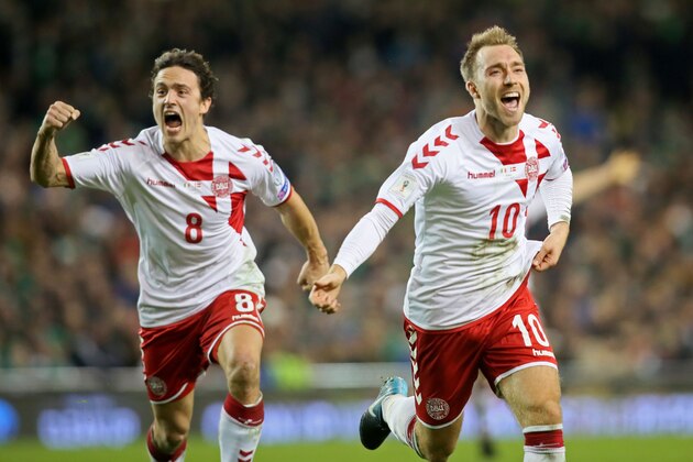 Denmark's midfielder Christian Eriksen celebrates with Denmark's midfielder Thomas Delaney (L) after scoring their third goal during the FIFA World Cup 2018 qualifying football match, second leg, between Republic of Ireland and Denmark at Aviva Stadium in Dublin on November 14, 2017. / AFP PHOTO / Paul FAITH        (Photo credit should read PAUL FAITH/AFP/Getty Images)