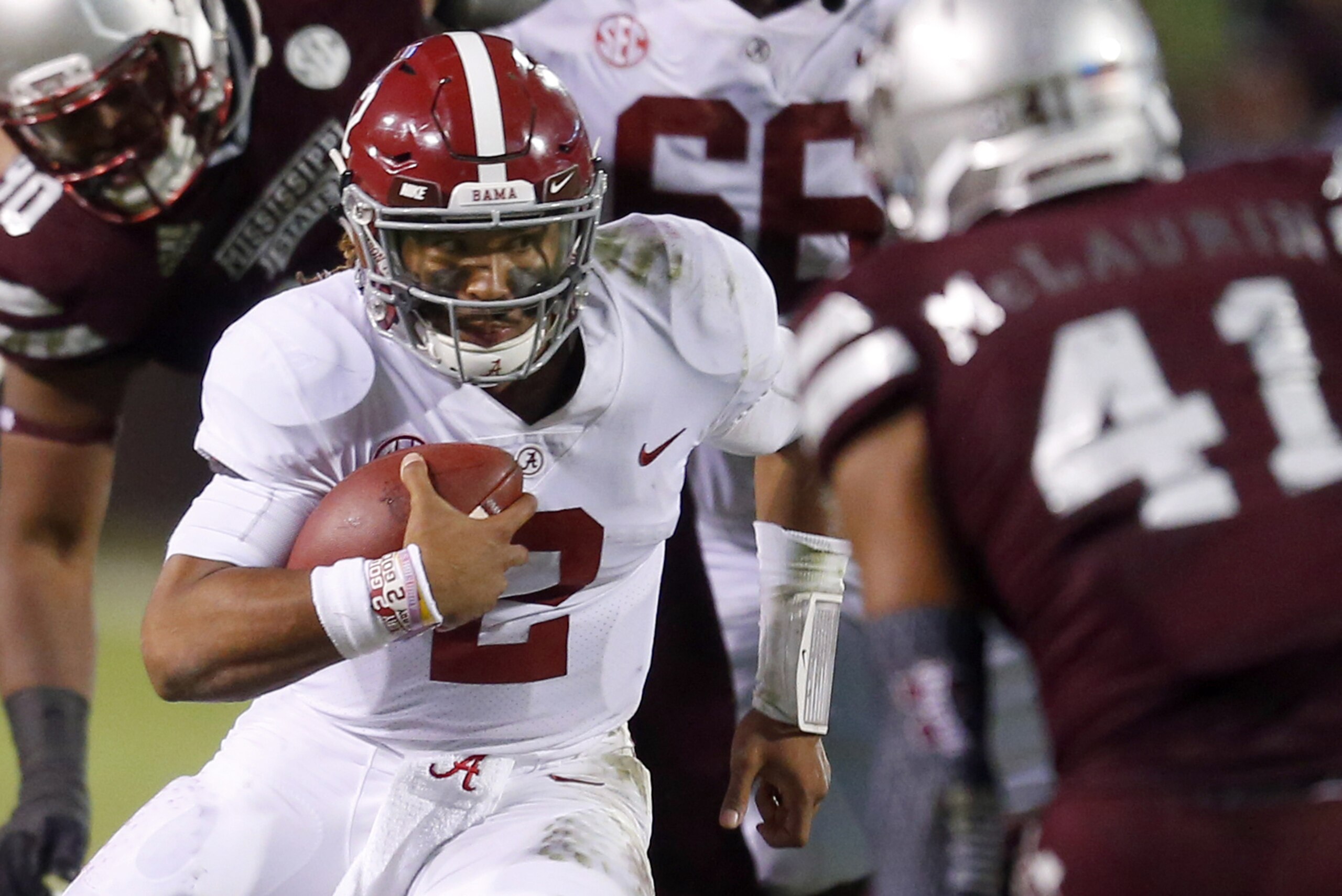 STARKVILLE, MS - NOVEMBER 11: Jalen Hurts #2 of the Alabama Crimson Tide carries for a first down during the second half of an NCAA football game against the Mississippi State Bulldogs at Davis Wade Stadium on November 11, 2017 in Starkville, Mississippi. (Photo by Butch Dill/Getty Images)