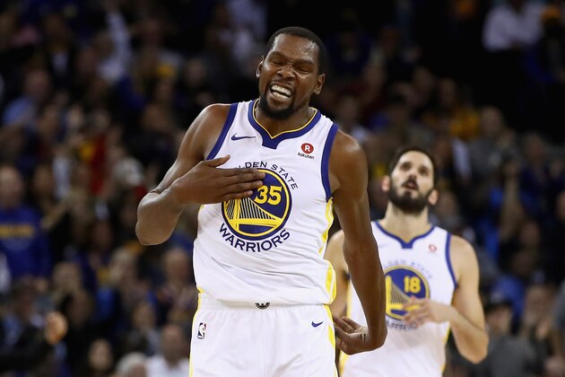 OAKLAND, CA - NOVEMBER 13: Kevin Durant #35 of the Golden State Warriors reacts after teammate Shaun Livingston #34 dunked the ball against the Orlando Magic at ORACLE Arena on November 13, 2017 in Oakland, California. NOTE TO USER: User expressly acknowledges and agrees that, by downloading and or using this photograph, User is consenting to the terms and conditions of the Getty Images License Agreement. (Photo by Ezra Shaw/Getty Images) OAKLAND, CA - NOVEMBER 13: Kevin Durant #35 of the Golden State Warriors reacts after teammate Shaun Livingston #34 dunked the ball against the Orlando Magic at ORACLE Arena on November 13, 2017 in Oakland, California. NOTE TO USER: User expressly acknowledges and agrees that, by downloading and or using this photograph, User is consenting to the terms and conditions of the Getty Images License Agreement. (Photo by Ezra Shaw/Getty Images)