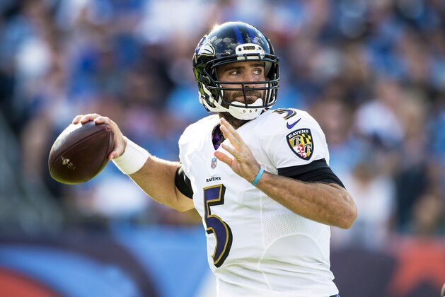 NASHVILLE, TN - NOVEMBER 5:  Quarterback Joe Flacco #5 of the Baltimore Ravens looks for a receiver during a NFL game against the Baltimore Ravens at Nissan Stadium on November 5, 2017 in Nashville, Tennessee.  (Photo by Ronald C. Modra/Sports Imagery/Getty Images)