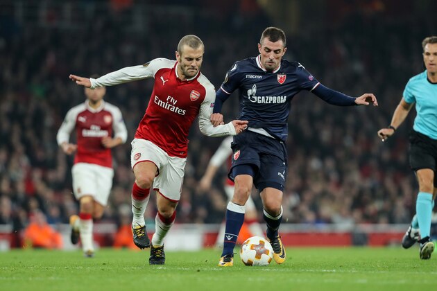 LONDON, ENGLAND - NOVEMBER 02: Jack Wilshere of Arsenal and Nenad Krsticic of Red Star Belgrade battle for the ball during UEFA Europa League Group H match between Arsenal and Red Star Belgrade (Crvena Zvezda) at The Emirates, London 2 Nov 2017 (Photo by TF-Images/TF-Images via Getty Images)
